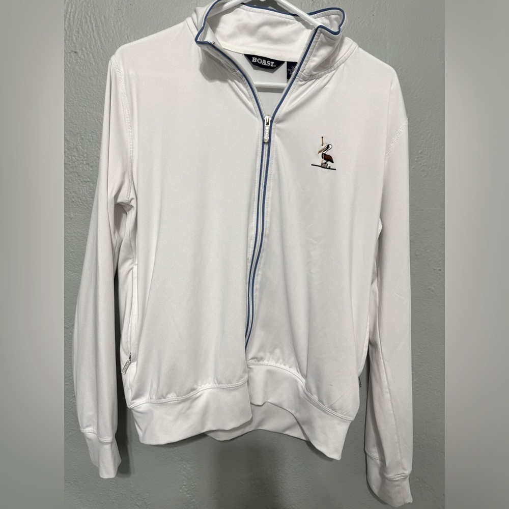 Women's golf jacket with pelican logo